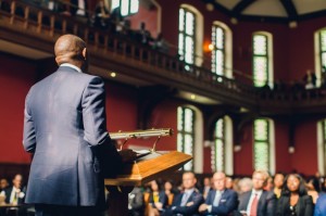 Tony Elumelu addresses the audience at the Oxford Union during the Oxford Africa Conference